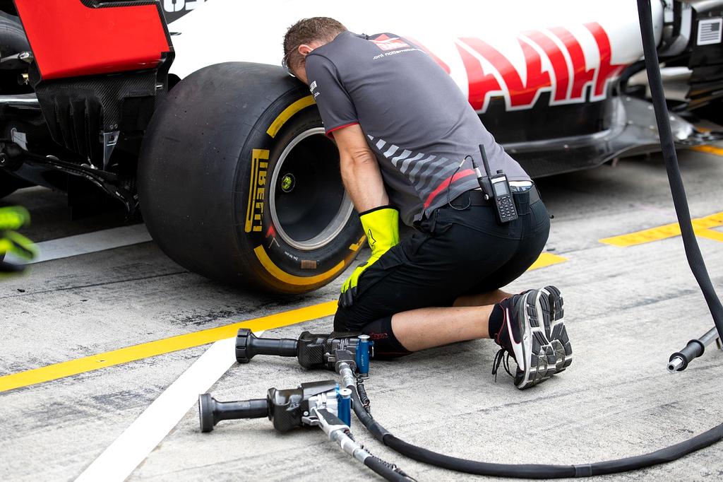 Technicians discussing AC plans
